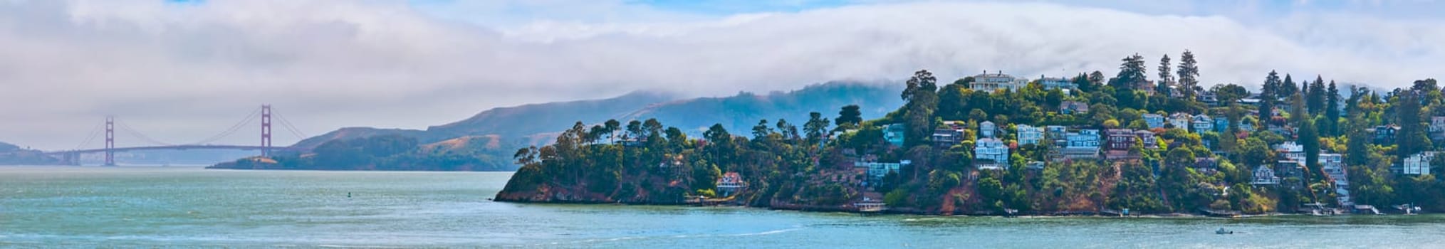Image of Panorama California Tiburon coastline with Golden Gate Bridge and clouds rolling over mountains
