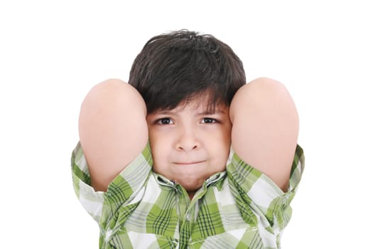 Close up portrait of a young boy child smiling with arms up behind his head.