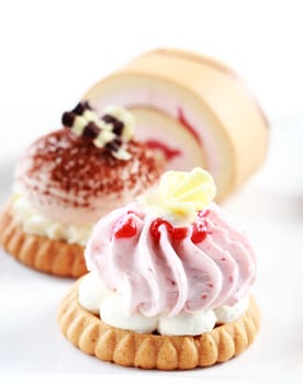 Sweet whipped cream cake with strawberry or chocolate
