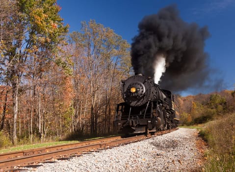 CUMBERLAND, MD - OCTOBER 17: Western Maryland Railroad steam train on October 17, 2011. This scenic railroad offers excursions pulled by a 1916 Baldwin locomotive