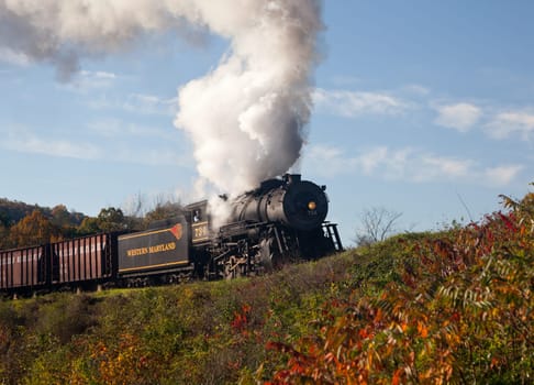 CUMBERLAND, MD - OCTOBER 17: Western Maryland Railroad steam train on October 17, 2011. This scenic railroad offers excursions pulled by a 1916 Baldwin locomotive