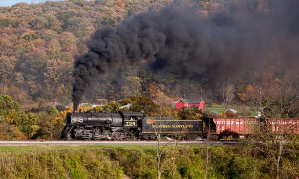 CUMBERLAND, MD - OCTOBER 17: Western Maryland Railroad steam train on October 17, 2011. This scenic railroad offers excursions pulled by a 1916 Baldwin locomotive