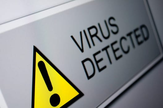 Closeup of Virus Detected Sign on LCD Screen