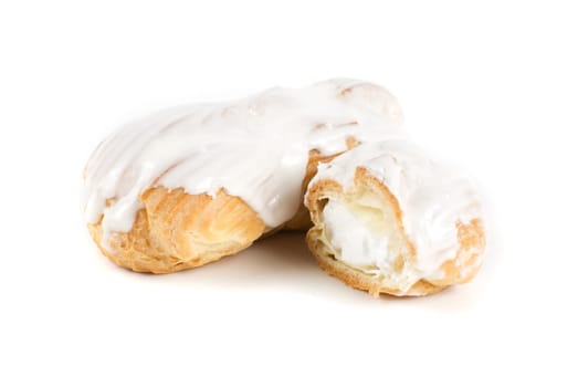 Cream eclairs isolated on a white background