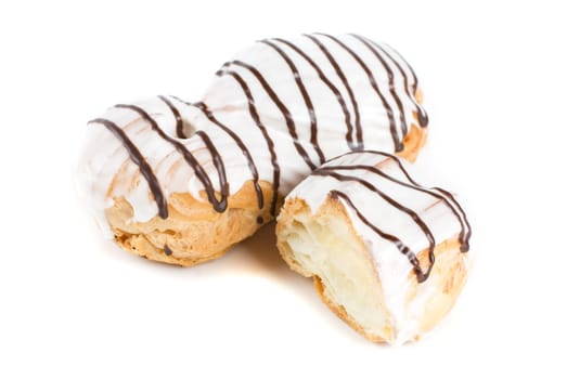 Cream eclairs isolated on a white background