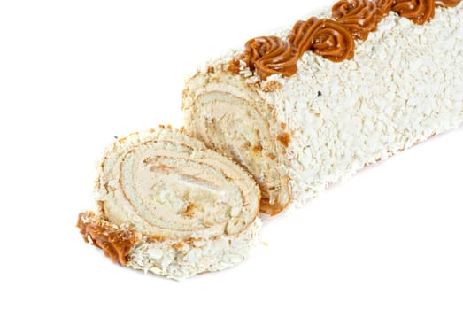 Chocolate Swiss roll closeup isolated on a white background