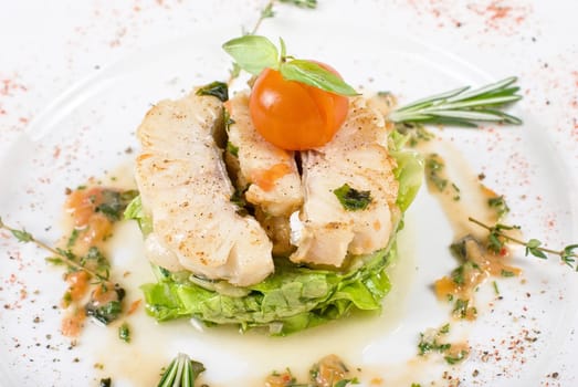 Salad of roasted filet pikeperch with courgette and aubergine, and cherry tomato