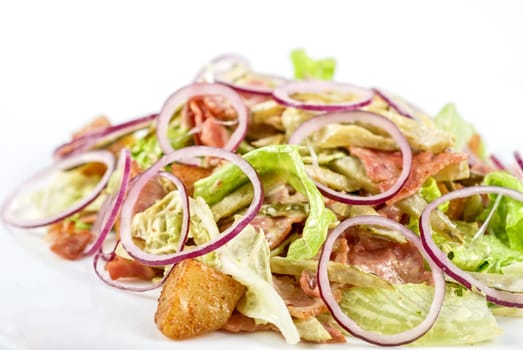 Onion salad of meat with roast vegetables