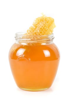 jar of organic honey on white background