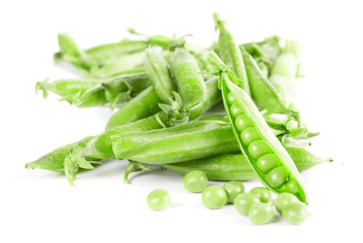 Ripe pea vegetable with green leaf isolated on white background