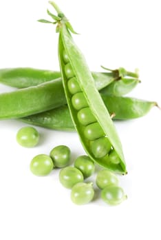 Ripe pea vegetable with green leaf isolated on white background