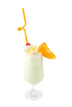 milk fruit cocktail with slice of orange cream and pipe