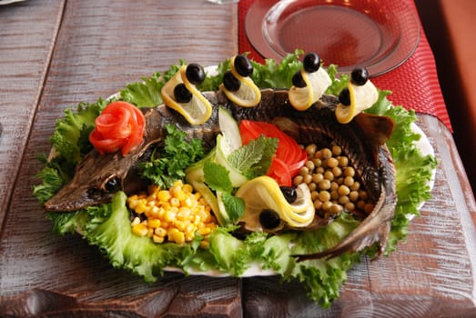 Prepared Sterlet with vegetables tasty dish