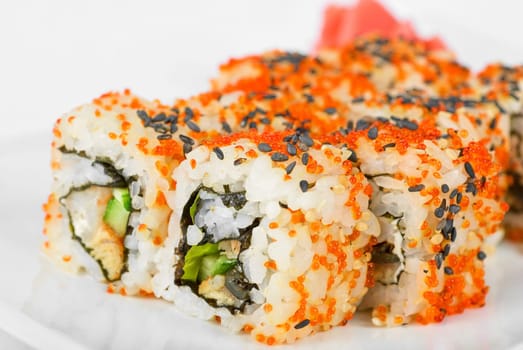 Sushi rolls at plate isolated on a white