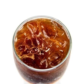 Top view of cola glass closeup on a white