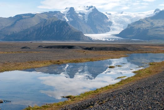 Vatnajokull reflected on the river in Iceland