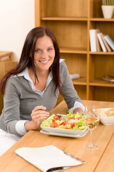 Healthy lunch at home attractive woman read magazine eat salad
