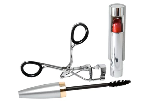 Nipper and brush for eyelashes on a white background