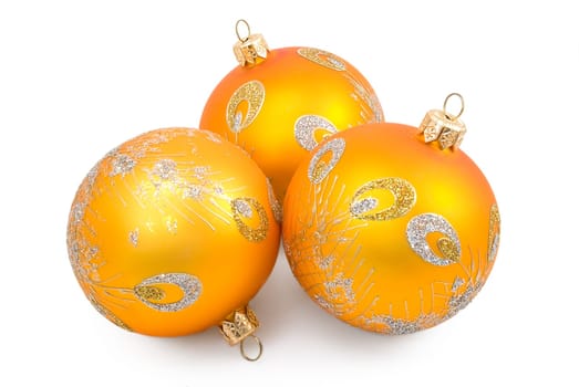 Three Christmas-tree toys on the white background