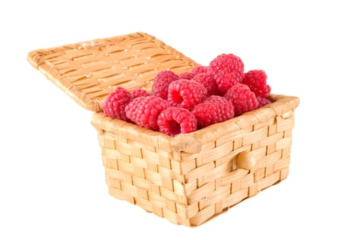 The bast-basket with a raspberry is photographed on a white background