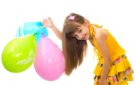 The girl in yellow clothes with balloons