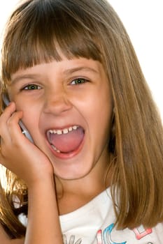 The girl talks by mobile phone