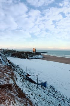 a snowy coastal scene in ballybunion ireland