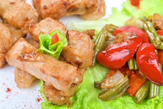 Orient salad with spicy chicken meat and roasted vegetables