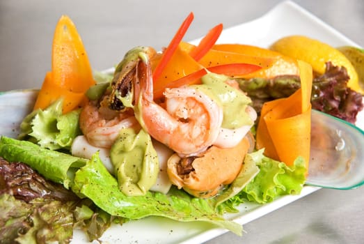 appetizer closeup dish of seafood and vegetables