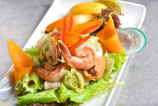 appetizer closeup dish of seafood and vegetables