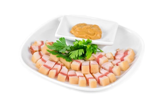 Sliced pig lard with greens closeup