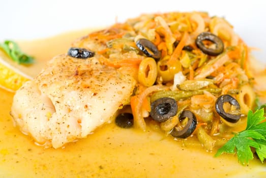 Tasty fish pike perch with mix of vegetables