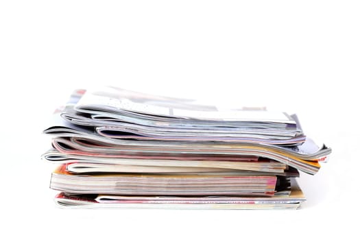 Batch of magazines isolated on white