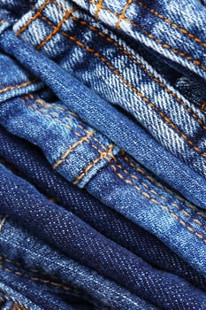 Stack of different jeans - detail