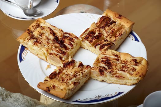 4 pieces of apple pie on a plate