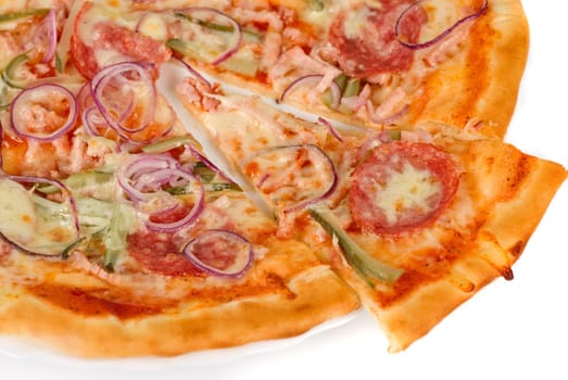 pizza closeup with smoked meat, salami, gherkin, onion and mozzarella cheese