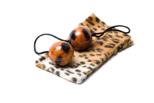 Leopard vaginal balls with case isolated on a white