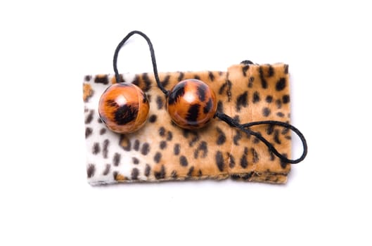 Leopard vaginal balls with case isolated on a white