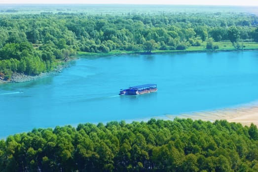 river motor ship is drifting on the river