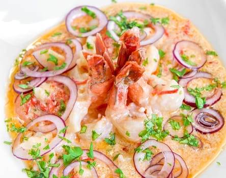 King shrimps with vegetables at cream sauce