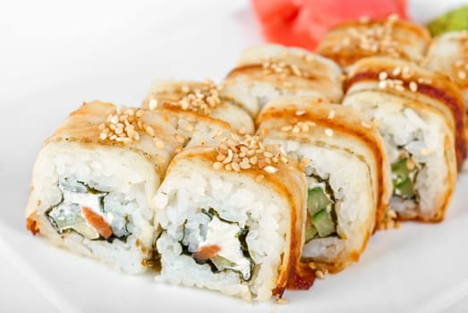 Sushi rolls at plate isolated on a white