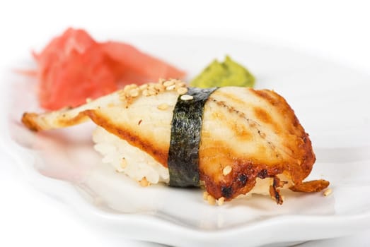 unagi sushi of eel with ginger, seaweed and sesame