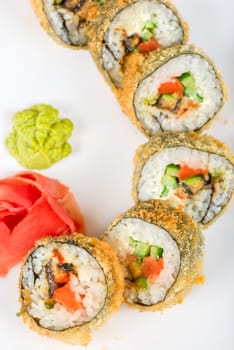 Sushi rolls at plate isolated on a white