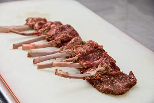 raw marinated lamb meat on the table