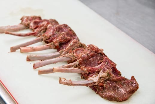 raw marinated lamb meat on the table