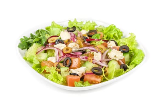 greece salad at plate isolated on a white