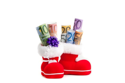 Euro in boot of Santa Claus white background