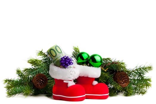Euro in boot of Santa Claus white background
