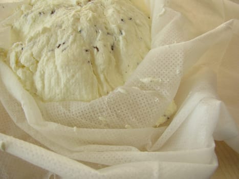 Fresh curd in a cloth
