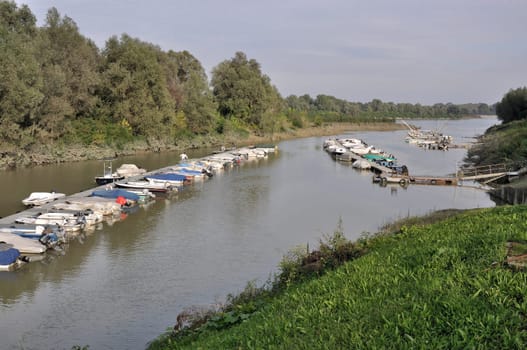 floating quays of harbour on a lateral ramification of  po river, in emilia near parma